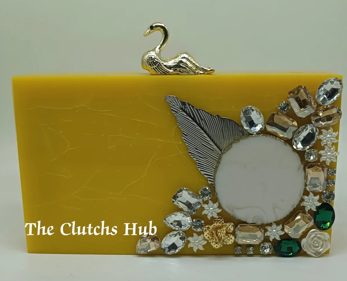 Premium quality resin clutch bag.yellow colour all colours available order now.